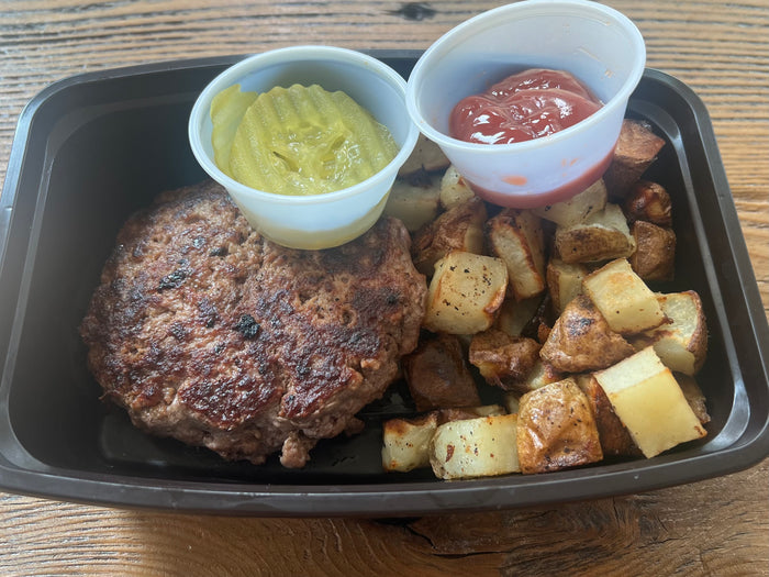 Hamburger Patty with Pickles and Roasted Potatoes